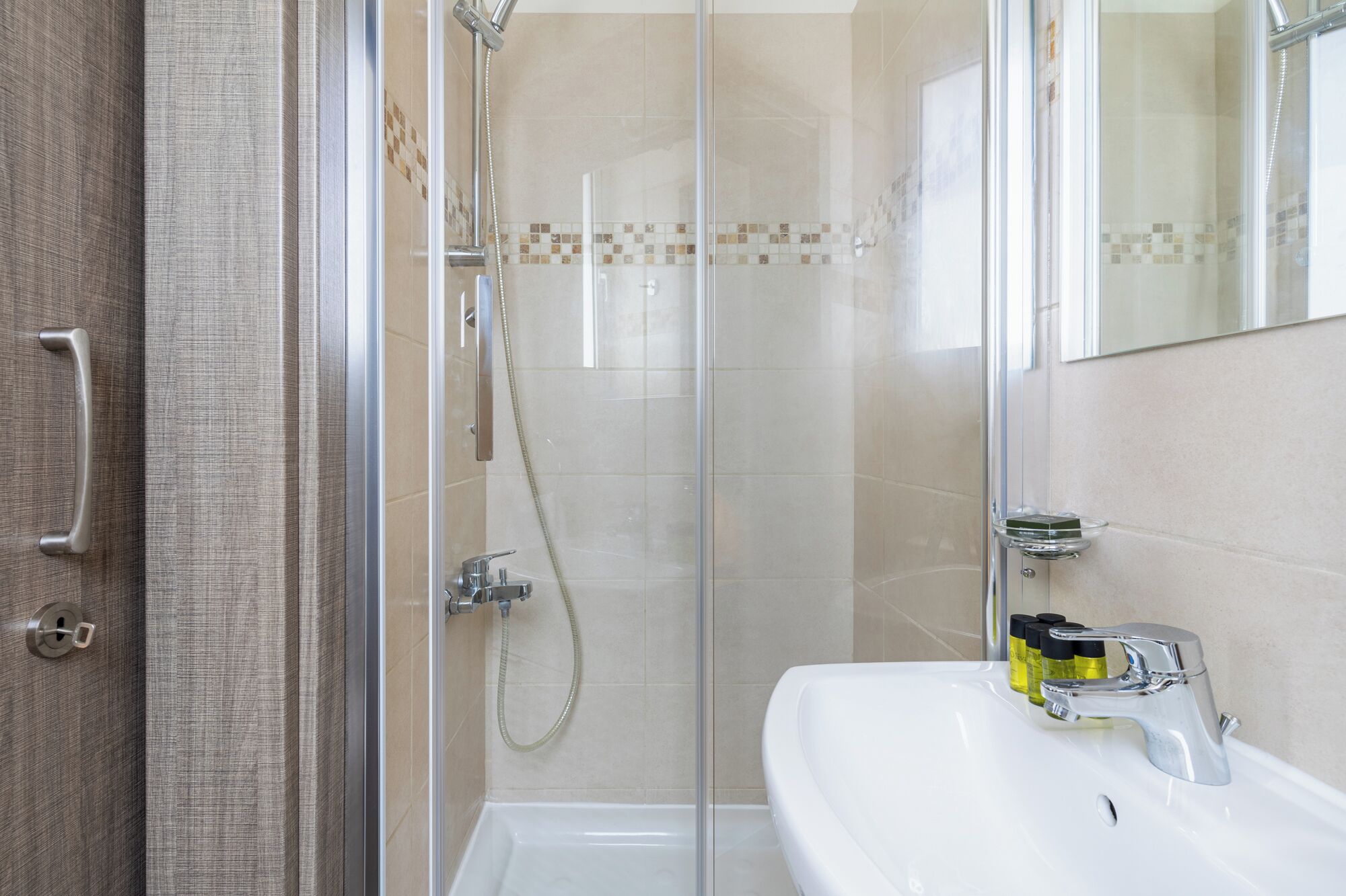 Apartment, Balcony, City View | Bathroom | Shower, free toiletries, hair dryer, slippers