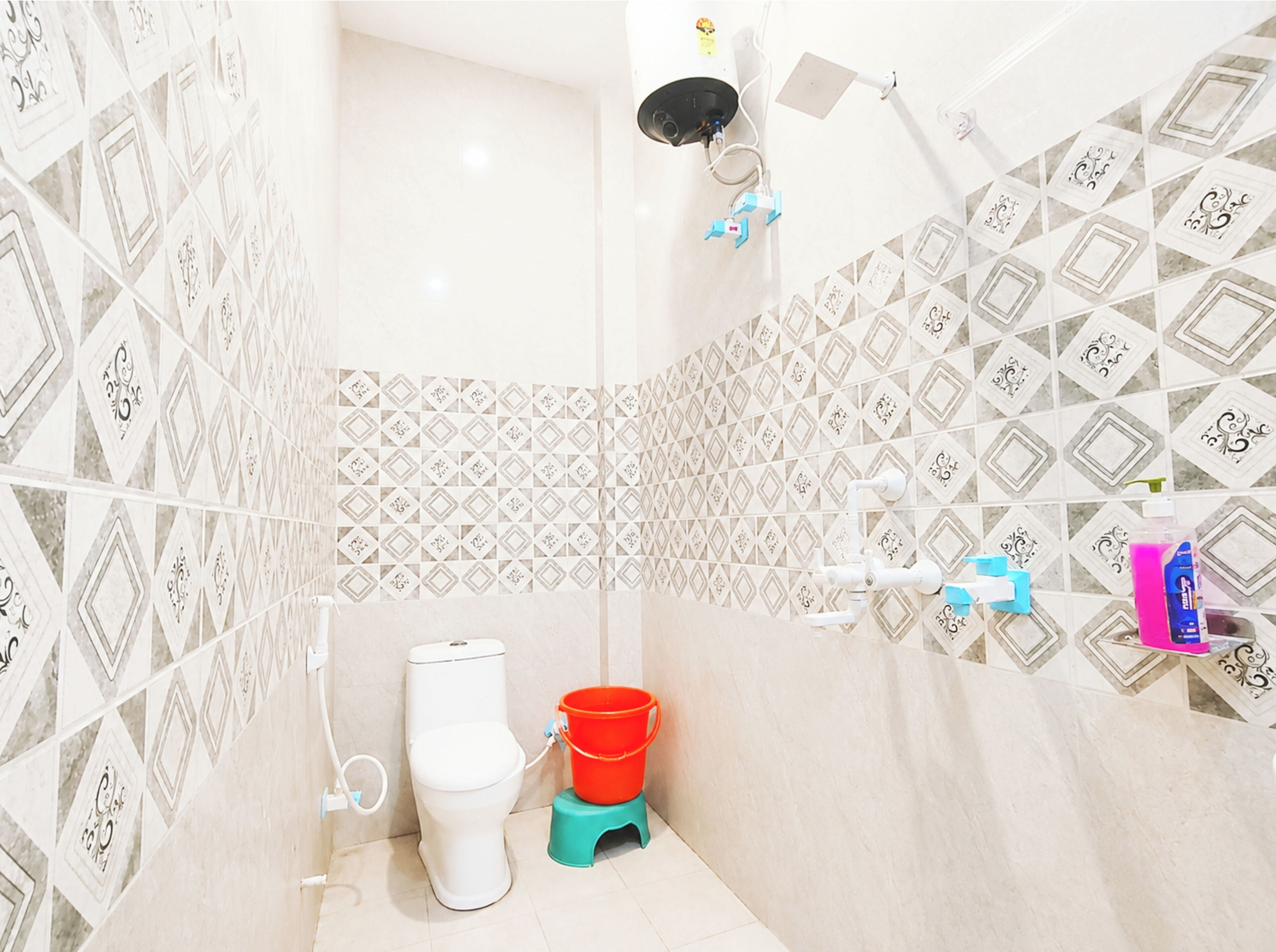Shower, rainfall showerhead, slippers, towels