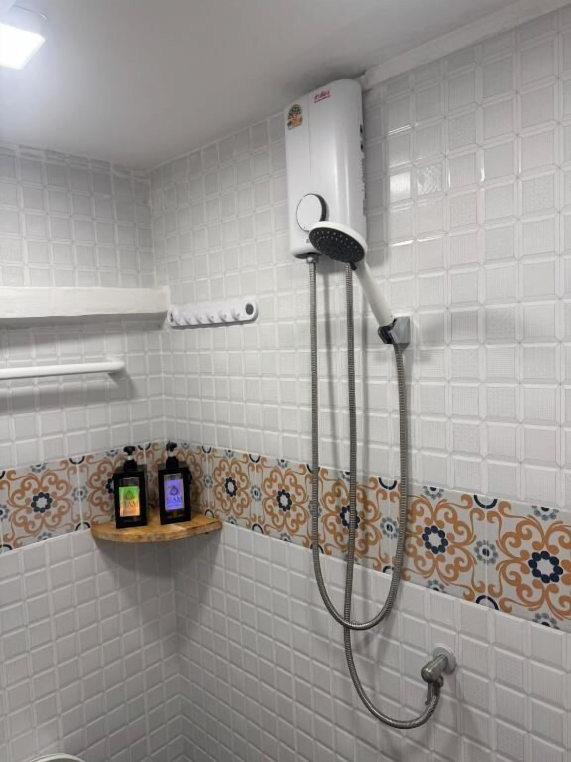 Shower, free toiletries, hair dryer, towels