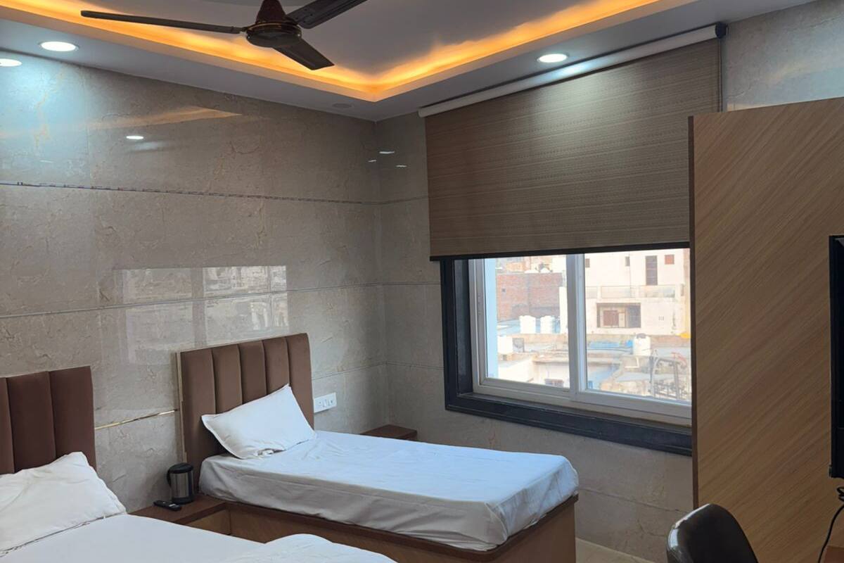 ห้องแฟมิลี่สำหรับสี่ท่าน | โต๊ะทำงาน, เตารีด/โต๊ะรีดผ้า, Wi-Fi ฟรี, ผ้าปูที่นอน