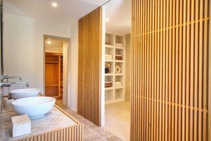 Shower, hair dryer, towels, toilet paper
