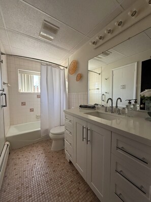 Hair dryer, towels, soap, shampoo