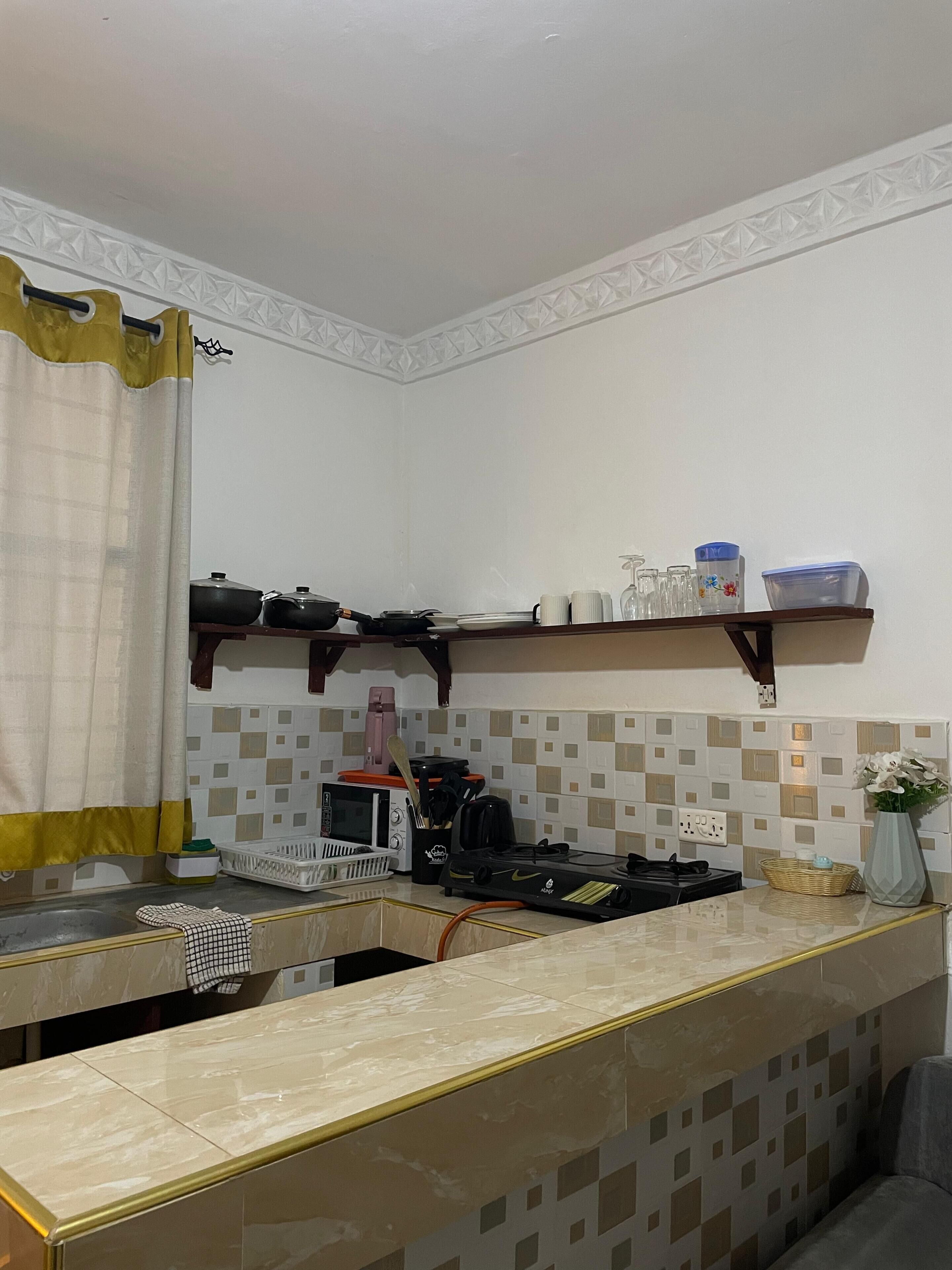 Fridge, microwave, electric kettle, toaster