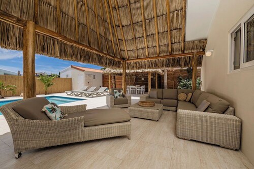 Have your own personal Palapa with this 3 bdrm, 3 bath home in the Bushiri neighborhood!