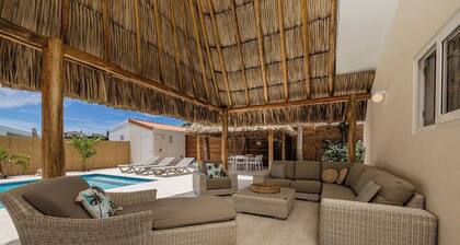 Have your own personal Palapa with this 3 bdrm, 3 bath home in the Bushiri neighborhood!