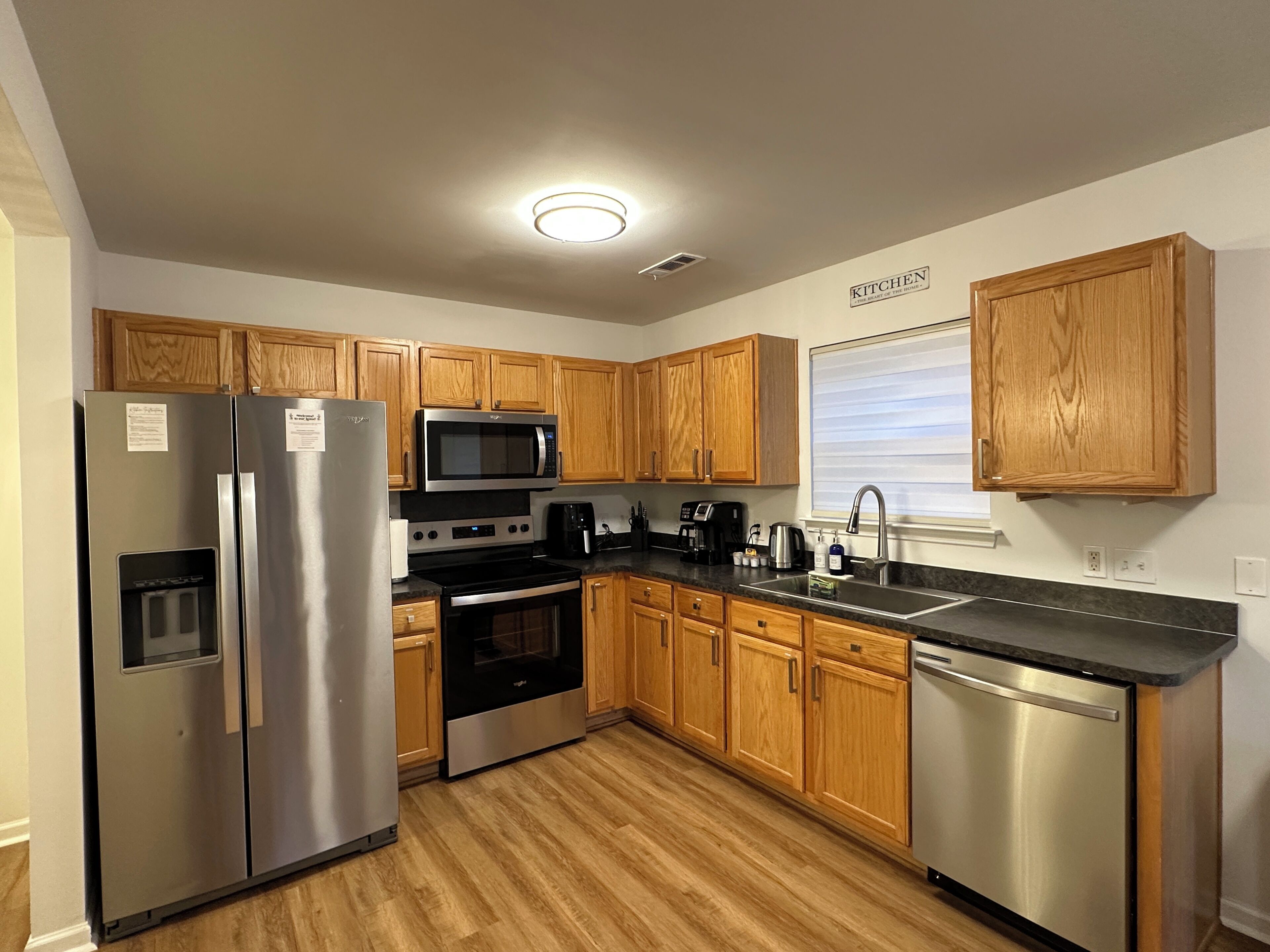 Coffee/tea maker, fridge, microwave, oven