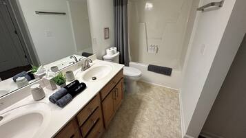 Hair dryer, towels, soap, shampoo