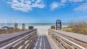 A wooden boardwalk leading to a beach with a clear sky. - Elegant Santa Rosa Beach House w/ Community Perks (Santa Rosa Beach)