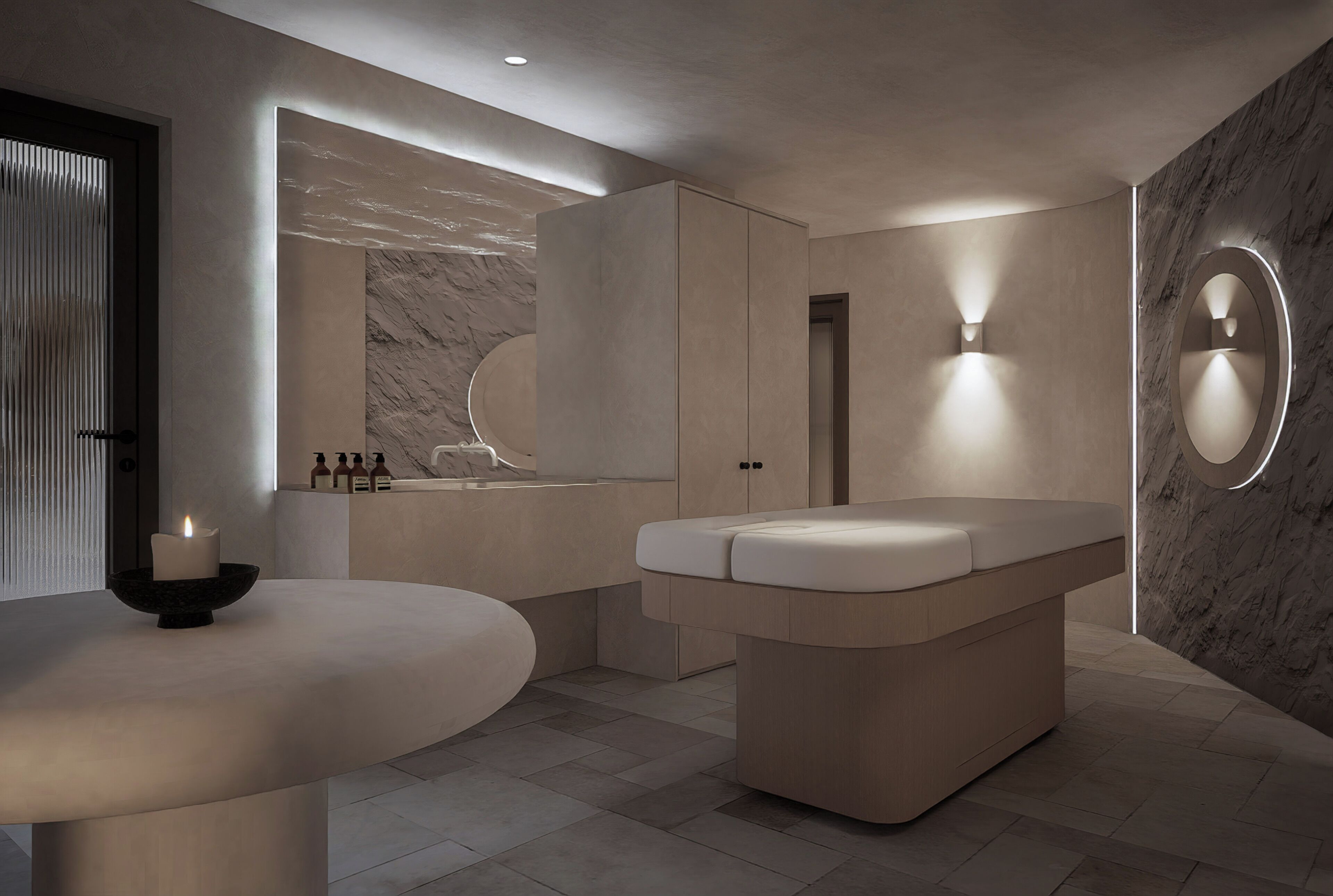 A modern bathroom with a freestanding bathtub, a vanity with a mirror, and a wall-mounted light fixture.