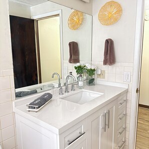 Hair dryer, towels, soap, toilet paper