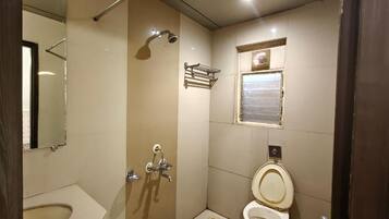 Shower, free toiletries, towels, soap