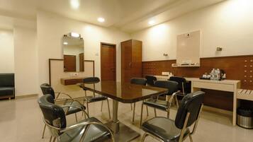 Deluxe Quadruple Room, Air conditioning, City View | In-room dining