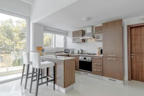 Appartamento, balcone, vista giardino | Cucina privata