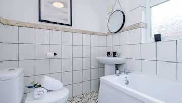 Shower, hair dryer, towels, shampoo