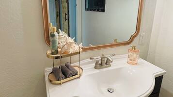 Hair dryer, towels, soap, shampoo