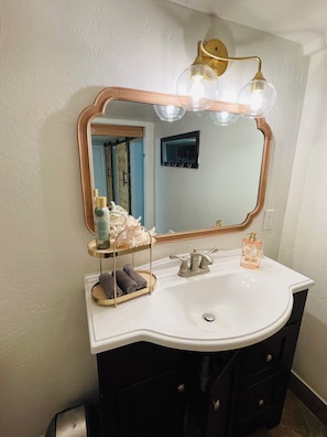 Hair dryer, towels, soap, shampoo