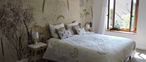 Iron/ironing board, travel crib, free WiFi, bed sheets