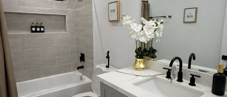 Hair dryer, bidet, towels, soap