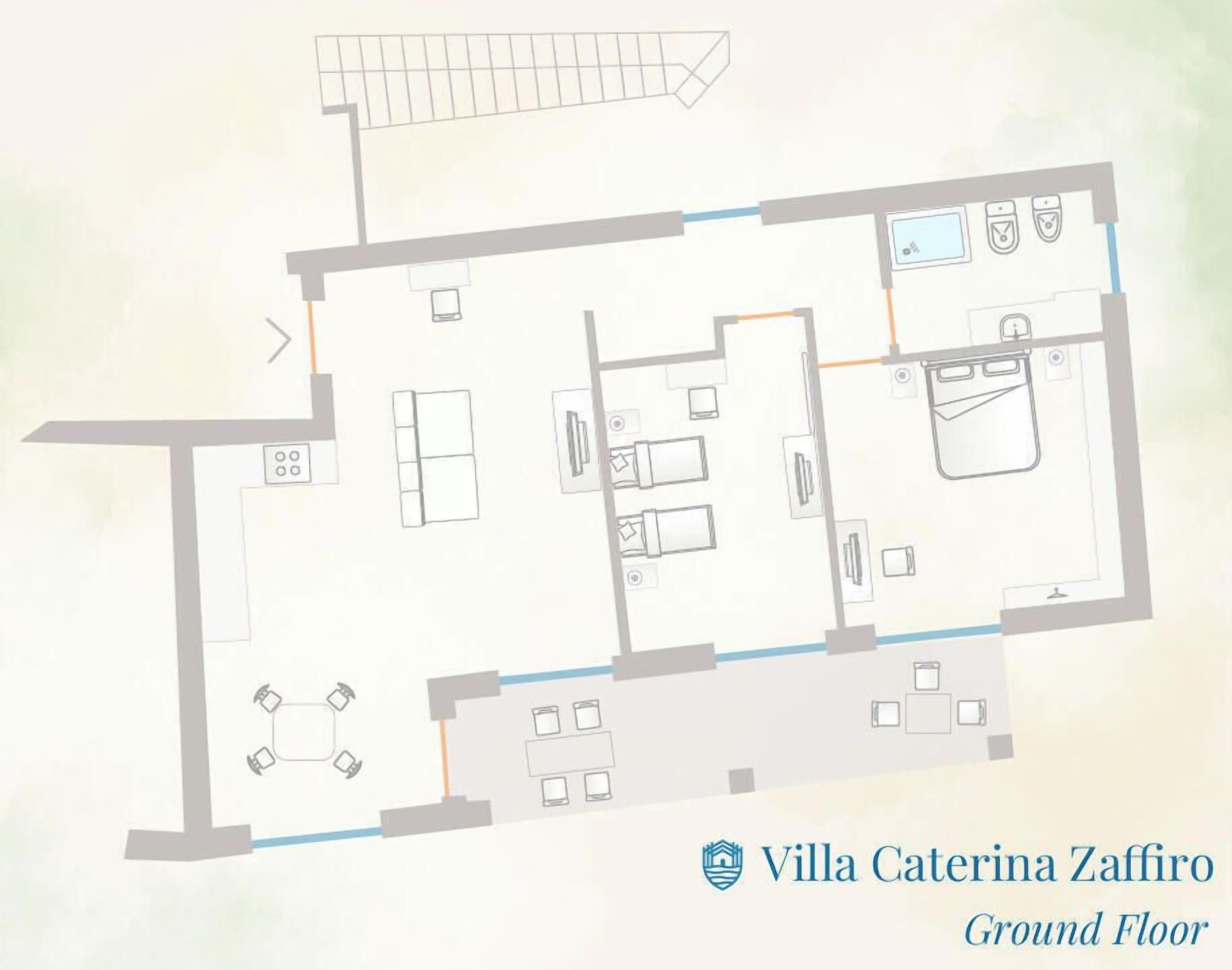 A ground floor layout of Villa Caterina Zaffiro with a kitchen, dining area, and a small seating area.