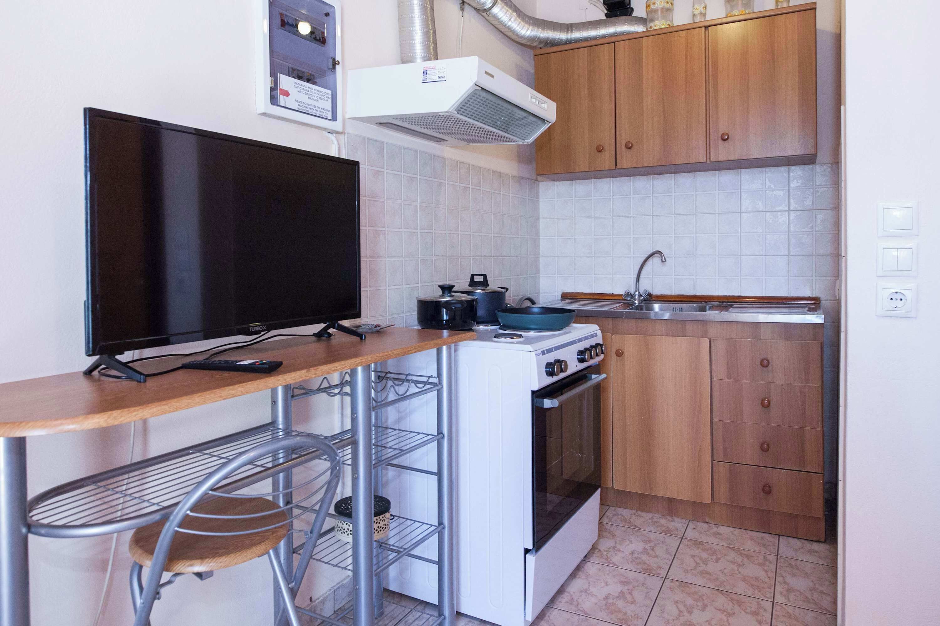 Cafeteira/chaleira, geladeira, fogão, cooktop