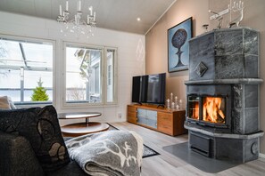 TV, fireplace - Lakeside Villa Norva Private Sauna by Lapland Host (Rovaniemi)