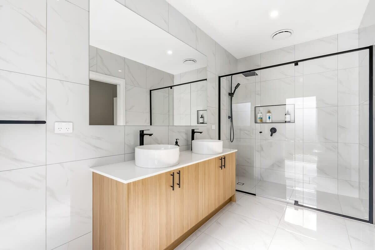 Shower, hair dryer, towels, shampoo