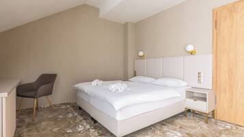 Desk, laptop workspace, free WiFi, bed sheets