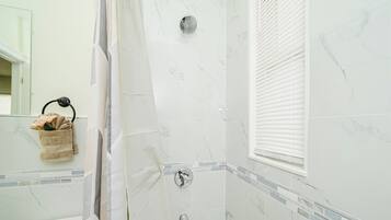 Hair dryer, towels, soap, shampoo