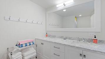 Hair dryer, towels, soap, toilet paper