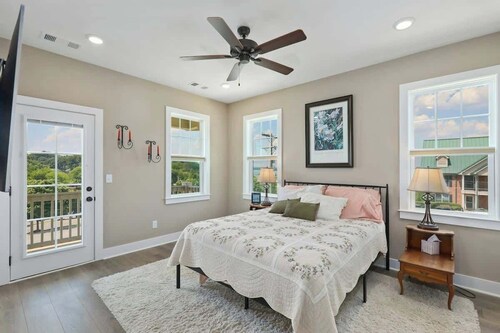 Lovely townhome with water-view, balcony, central AC & washer/dryer