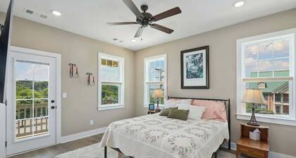 Lovely townhome with water-view, balcony, central AC & washer/dryer