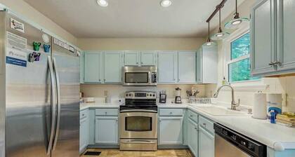 Cozy custom-furnished home with yard, firepit, children's items, AC, & office
