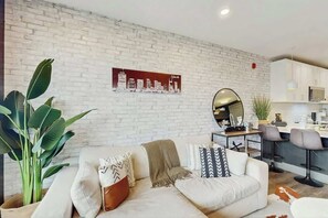 TV - Modern Muse downtown condo with private balcony, central AC, & rooftop lounge (Nashville)