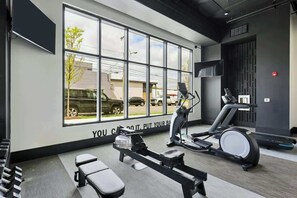 Fitness facility - Muse | Modern condo in great downtown location with balcony & rooftop lounge (Nashville)