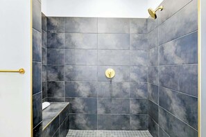 Shower, hair dryer, towels - Muse | Ideally-located condo with city view, central AC, balcony & gym (Nashville)