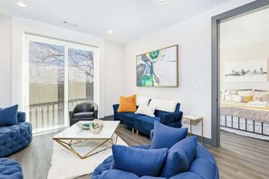 TV, offices - Muse | Ideally-located condo with city view, central AC, balcony & gym (Nashville)