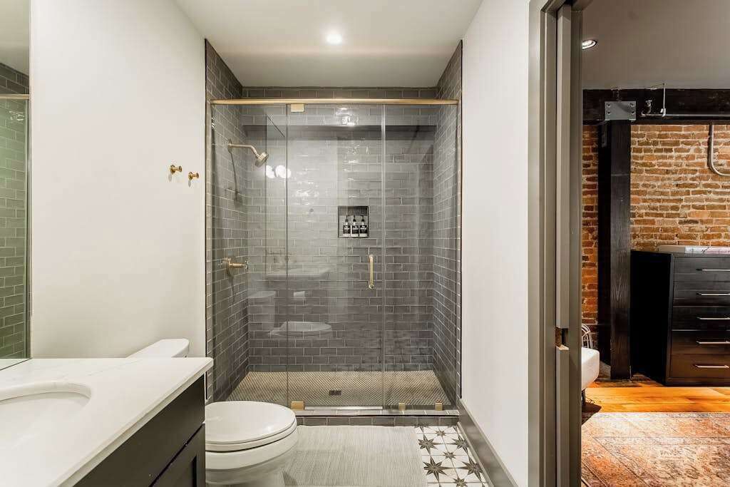 Shower, hair dryer, towels, shampoo