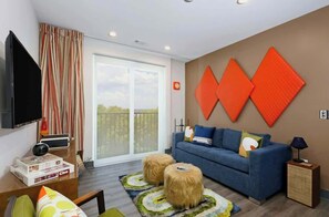TV, offices - Upscale 4th-floor condo near top attractions with fast WiFi & rooftop lounge (Nashville)