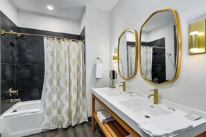 Shower, hair dryer, towels, shampoo - Muse | Rockstar downtown condo with private balcony, central AC & gym (Nashville)