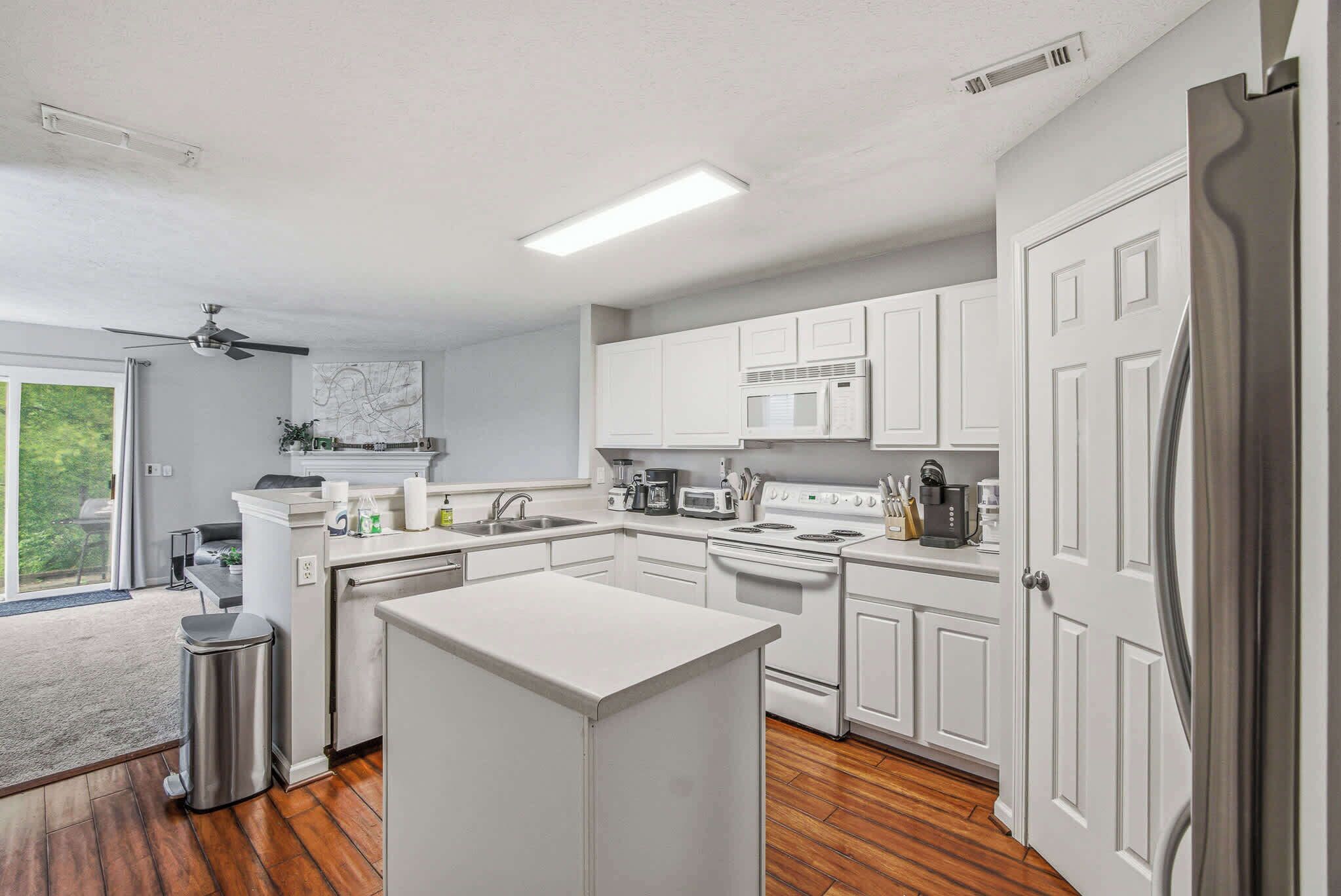 Kitchen Paradise, bright and airy kitchen with modern appliances and a perfect view for meal prep!