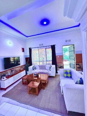Family Bungalow, Garden View | Living area - Eva residence (Arusha)