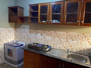 Family Apartment, Mountain View | Private kitchen - Eva residence (Arusha)