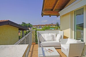 Apartment, Balcony | Property grounds - Montecolo Resort E7 by Wonderful Italy (Manerba del Garda)