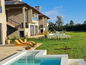 Suite Deluxe, vista a la montaña | Alberca | 4 albercas al aire libre 