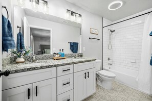 Hair dryer, towels, soap, toilet paper