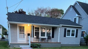 A single-story house with a front porch, a mailbox, and a number '310' on the wall. - Shore House, Beach + Boardwalk, Parking for 7, Point Pleasant Beach (Point Pleasant Beach)