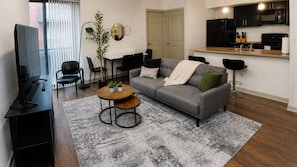 TV - Iron City Retreat | Modern 2BR Stay (Birmingham)