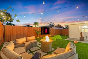 Terrace/patio - [New Listing] Coral Cove -Sleeps 12! Pool~Grill~Games~Gym~Cozy Backyard (Bradenton)