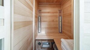 A sauna room with wooden walls and benches, equipped with ventilation systems. - Downtown Toronto row house. Close to Ossington, Trinity Bellwood & BMO field. (Toronto)