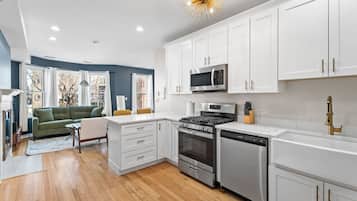 Coffee/tea maker, fridge, microwave, oven